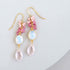 Opal Quartz Bezel Cluster EarringsDripping in gems, these long gemstone drop earrings are made with an opal quartz bezel, pink clear quartz and pink tourmaline gemstones.- 2.5" long- French hooks
- 1EarringsPARKEN JEWELRYVettedArcOpal Quartz Bezel