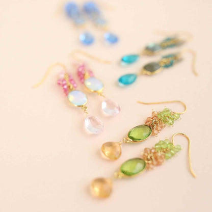 Citrine &amp; Peridot Bezel Cluster EarringsDripping in gems, these long drop earrings are made with a peridot quartz bezel paired with citrine and peridot gemstones.- 2.5" long- French hooks- 14k gold plated EarringsPARKEN JEWELRYVettedArcCitrine &amp; Peridot Bezel Cluster Earrings