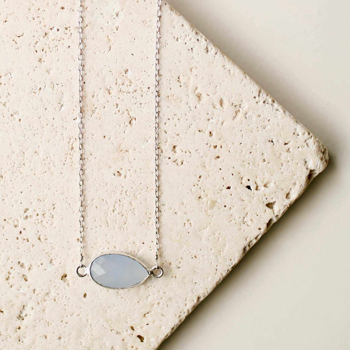 Blue Chalcedony Silver Minimalist NecklaceSimple, silver minimalist necklace with a beautiful blue chalcedony bezel set stone. Great for layering.- 16-18" long. Necklace has a 2" extender- Spring ring clasp-NecklacesPARKEN JEWELRYVettedArcsimple silver necklace