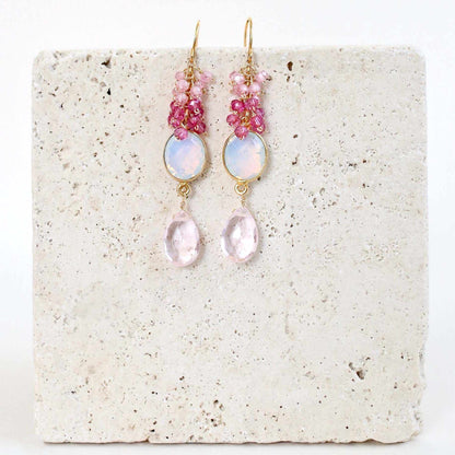 Bezel Cluster EarringsDripping in gems, these long gemstone drop earrings are a handmade combination of beautiful bezel set stones and clusters of gems.- 2.5" long- French hooks- 14k goldEarringsPARKEN JEWELRYVettedArcBezel Cluster Earrings