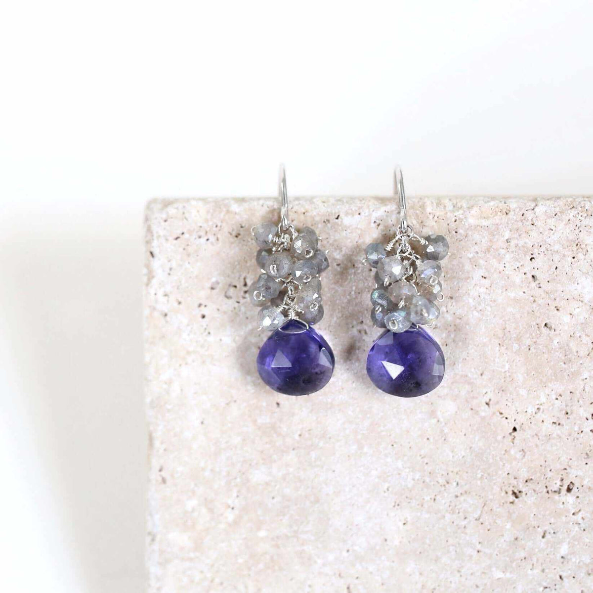 Tanzanite Quartz Silver Drop EarringsGemstone candy! Silver drop earrings with stunning tanzanite quartz gemstones topped with a gorgeous cluster of labradorite gems.
- 1.25" long- French hooks- RhodiumEarringsPARKEN JEWELRYVettedArcTanzanite Quartz Silver Drop Earrings