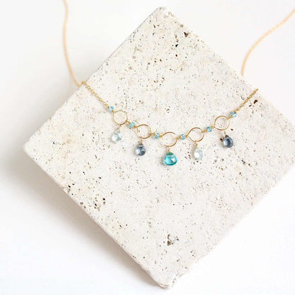 Blue Gemstone Mini Sparkler NecklaceWe like to think of this necklace as a delicate fairytale on a chain. Handmade with Aquamarine, Iolite and Aqua Blue Quartz gemstones
16 - 18" long with 2" extenderSNecklacesPARKEN JEWELRYVettedArcBlue Gemstone Mini Sparkler Necklace