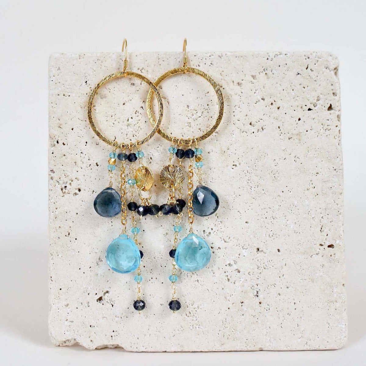 Amethyst &amp; Citrine Ammil EarringsMultiple strands of lush gems sparkle on a 1" hoop.
- Amethyst and Citrine gemstones- 3.5" long- French hooks- 14k gold plated .925 fine Italian sterling silver- MadEarringsPARKEN JEWELRYVettedArcAmethyst &amp; Citrine Ammil Earrings