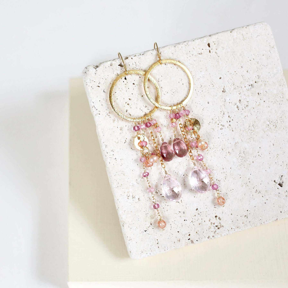 Iolite &amp; Aquamarine Ammil EarringsMultiple strands of lush gems sparkle on a 1" hoop.
- Aquamarine Quartz and Iolite gemstones- 3.5" long- French hooks- 14k gold plated .925 fine Italian sterling silEarringsPARKEN JEWELRYVettedArcIolite &amp; Aquamarine Ammil Earrings
