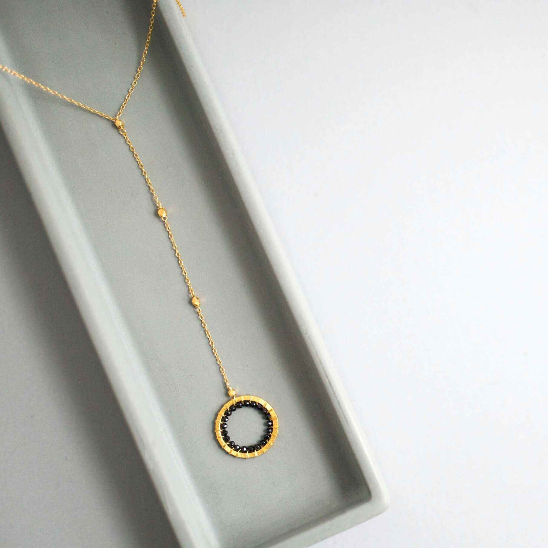 Black Spinel Halo Mini Y PendantThe Halo collection was our very first one. Intended to symbolize the intricate, universal energy woven within us all. This beautiful necklaces is ultra lightweight NecklacesPARKEN JEWELRYVettedArcBlack Spinel Halo