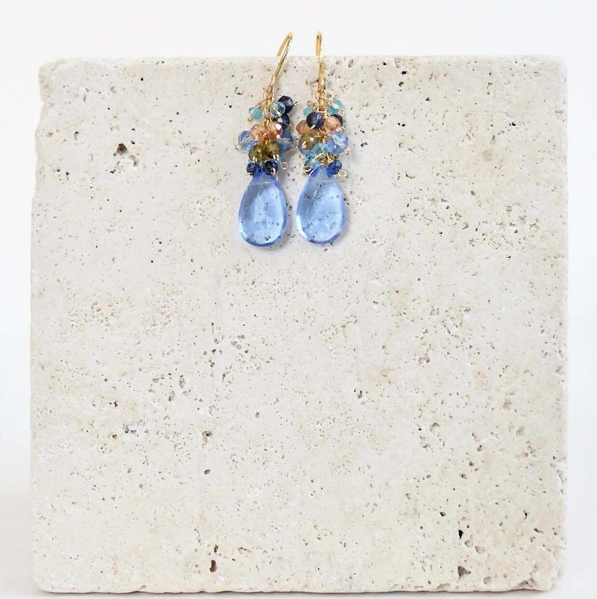 Sky Blue Quartz Bala EarringsStunning drops of color. Gold drop earrings made with sky blue quartz topped with a blue cluster of gems.
- 1.25" long- French hooks- 14k gold plated .925 fine ItaliEarringsPARKEN JEWELRYVettedArcSky Blue Quartz