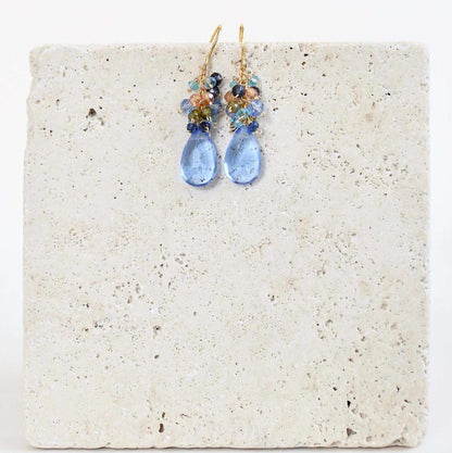 Sky Blue Quartz Bala EarringsStunning drops of color. Gold drop earrings made with sky blue quartz topped with a blue cluster of gems.
- 1.25" long- French hooks- 14k gold plated .925 fine ItaliEarringsPARKEN JEWELRYVettedArcSky Blue Quartz