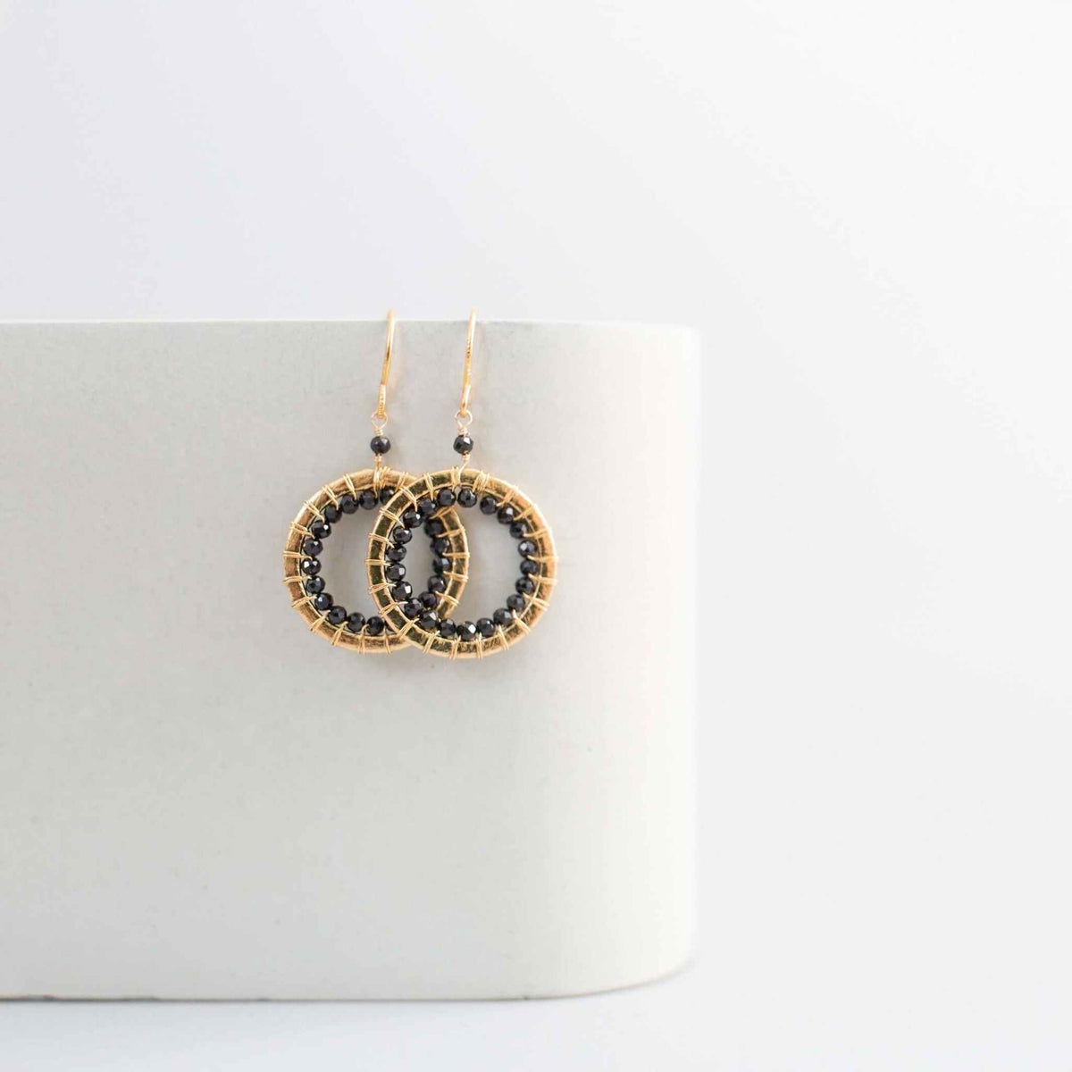 Black Spinel Mini Halo EarringsThe Halo collection was our very first one. Intended to symbolize the intricate, universal energy woven within us all. These small, sparkling Black Spinel earrings aEarringsPARKEN JEWELRYVettedArcBlack Spinel