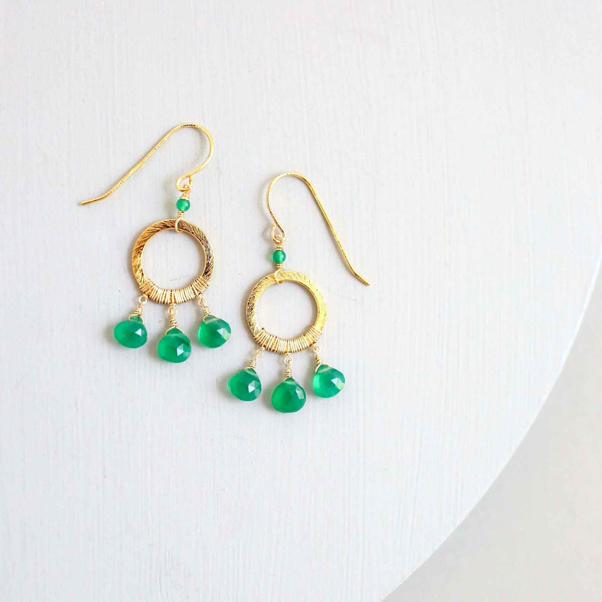 Green Onyx Mini Boho EarringsInspired by dream catchers, these boho minis are ready-to-wear with anything. 
- Green Onyx gemstones- 1.5" long- French Hooks- 14k gold plated over .925 Italian finEarringsPARKEN JEWELRYVettedArcGreen Onyx Mini Boho Earrings