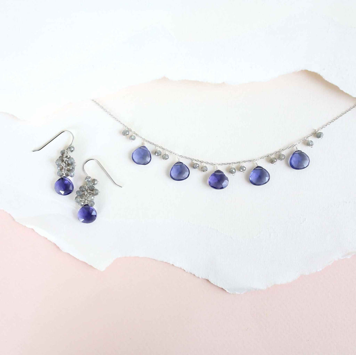 Tanzanite Quartz Silver Sparkler NecklaceA lovely string of sparkling gems.- Tanzanite Quartz &amp;amp; Labradorite gemstones- 16-18" long. Necklace has a 2" extender- Spring ring clasp- Rhodium plated .925 finNecklacesPARKEN JEWELRYVettedArcTanzanite Quartz Silver Sparkler Necklace