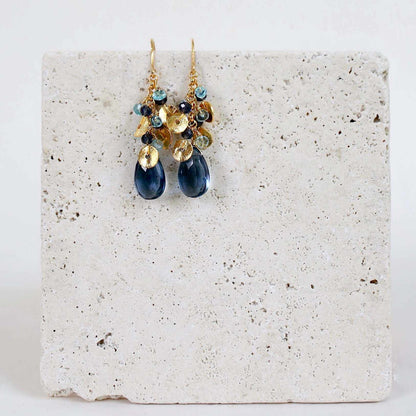 Iolite Aurora EarringsBeautiful small gold earrings made with oval shaped iolite gemstones and a cluster of gold and iolite gemstone accents.
- 1.5" long- French hooks
- 14k gold plated .EarringsPARKEN JEWELRYVettedArcIolite Aurora Earrings