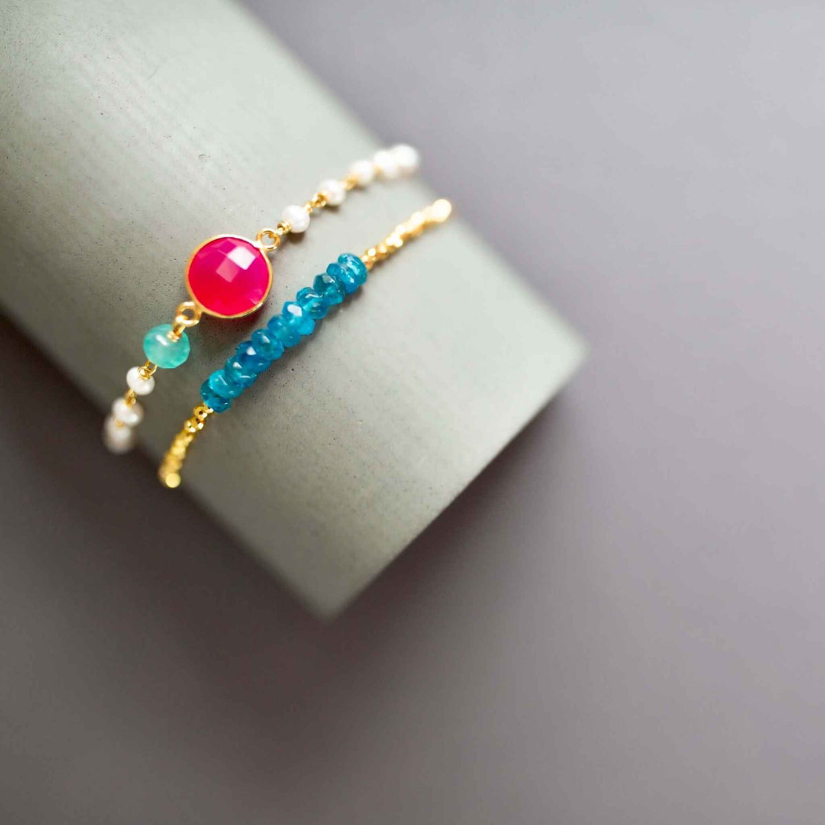 Neon Apatite Adjustable Stacking BraceletNeon Apatite Adjustable Stacking Bracelet &amp;mdash; an authentic gemstone bracelet featuring neon blue apatite stones with gold accents. The adjustable slider clasp fiBraceletsPARKEN JEWELRYVettedArcneon blue apatite meaning