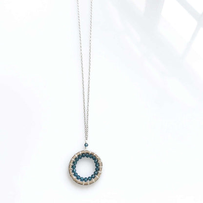 London Blue Quartz Halo Mini Silver PendantThe Halo collection was our very first one. Intended to symbolize the intricate, universal energy woven within us all. This beautiful necklace is ultra lightweight aNecklacesPARKEN JEWELRYVettedArcLondon Blue Quartz