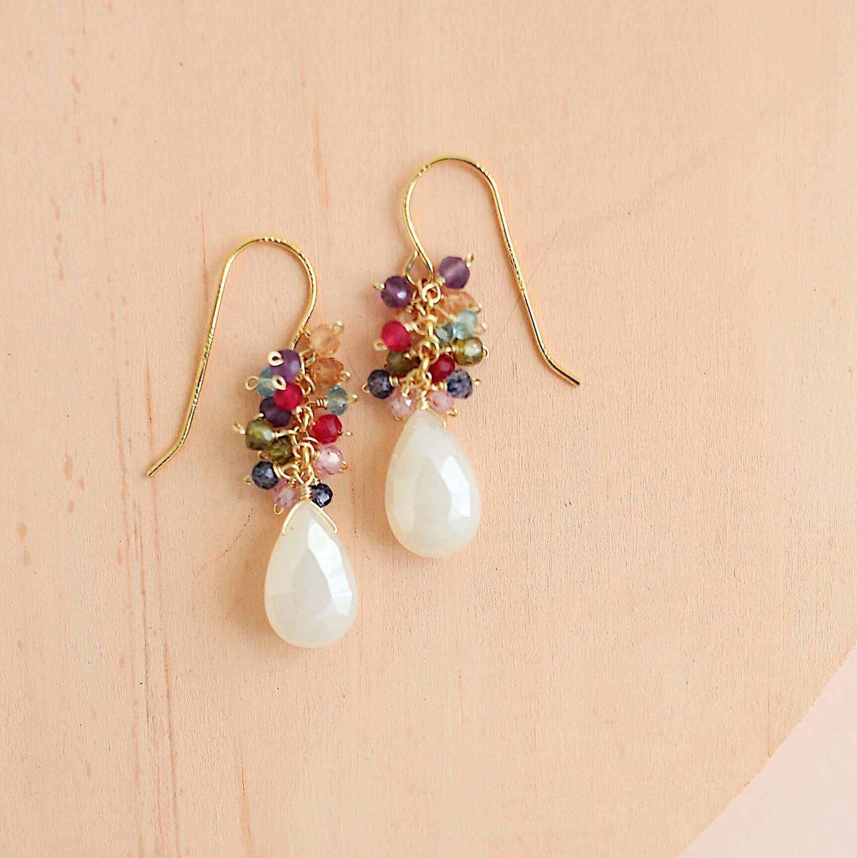 Bala EarringsStunning drops of color. Gold drop earrings made with stunning, colorful stones topped with a rainbow cluster of gems.
- 1.25" long- French hooks- 14k gold plated .9EarringsPARKEN JEWELRYVettedArcBala Earrings