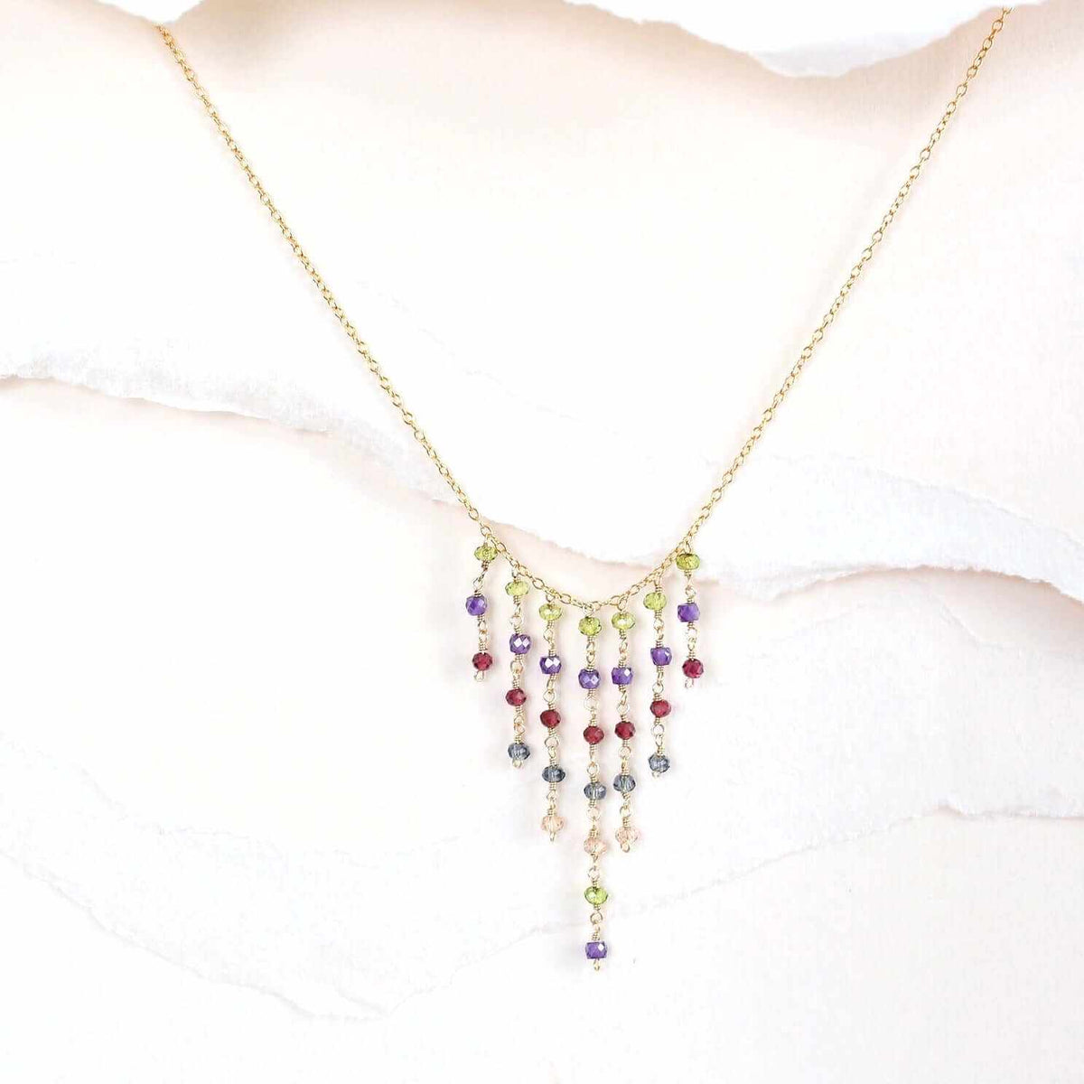 Rainbow Mini Fringe NecklaceThese super delicate necklaces are our unique gemstone version of fringe jewelry.
- Peridot, Amethyst, Garnet, London Blue Quartz &amp;amp; Champagne Quartz gemstones- 1NecklacesPARKEN JEWELRYVettedArcRainbow Mini Fringe Necklace