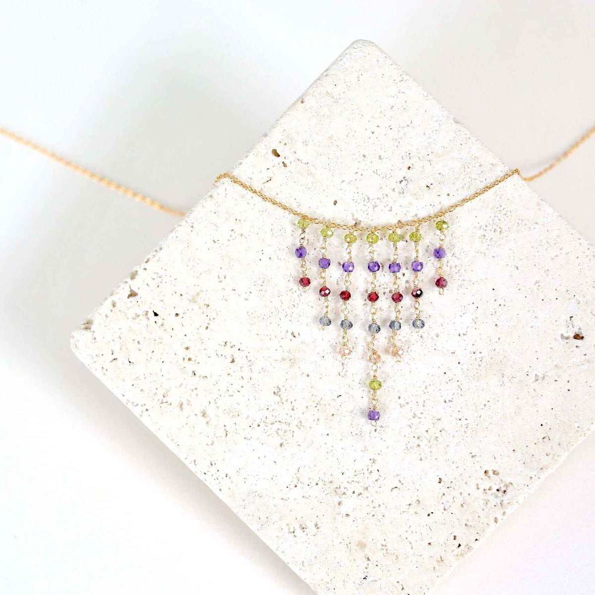 Rainbow Mini Fringe NecklaceThese super delicate necklaces are our unique gemstone version of fringe jewelry.
- Peridot, Amethyst, Garnet, London Blue Quartz &amp;amp; Champagne Quartz gemstones- 1NecklacesPARKEN JEWELRYVettedArcRainbow Mini Fringe Necklace