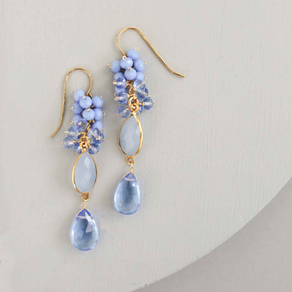 Bezel Cluster EarringsDripping in gems, these long gemstone drop earrings are a handmade combination of beautiful bezel set stones and clusters of gems.- 2.5" long- French hooks- 14k goldEarringsPARKEN JEWELRYVettedArcBezel Cluster Earrings