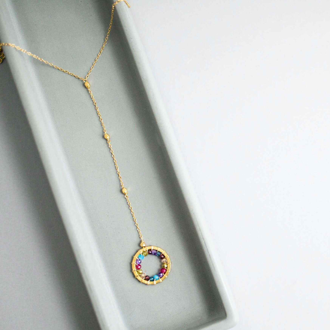 Rainbow Gemstone Halo Mini Y PendantThe Halo collection was our very first one. Intended to symbolize the intricate, universal energy woven within us all. This beautiful necklaces is ultra lightweight NecklacesPARKEN JEWELRYVettedArcRainbow Gemstone Halo