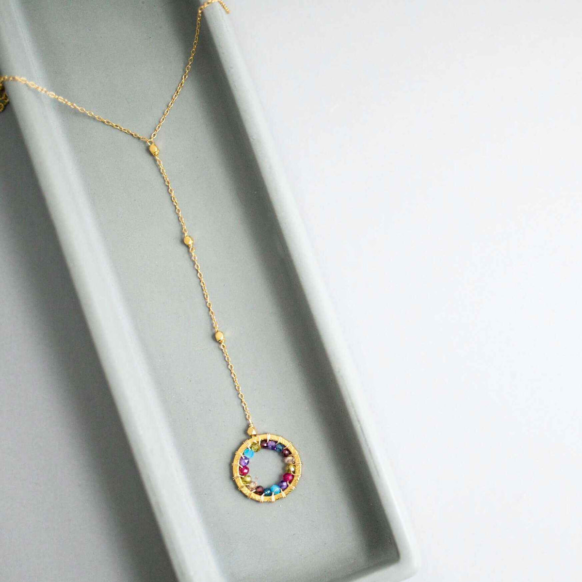 Rainbow Gemstone Halo Mini Y PendantThe Halo collection was our very first one. Intended to symbolize the intricate, universal energy woven within us all. This beautiful necklaces is ultra lightweight NecklacesPARKEN JEWELRYVettedArcRainbow Gemstone Halo