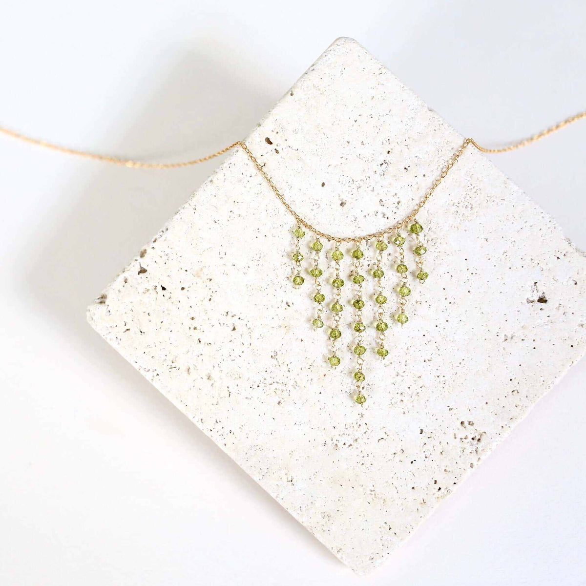 Peridot Mini Fringe NecklaceThese super delicate necklaces are our unique gemstone version of fringe jewelry.
- Peridot gemstones- 17-19" long with a 2" extender chain- Spring ring clasp- 14k gNecklacesPARKEN JEWELRYVettedArcPeridot Mini Fringe Necklace