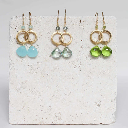 The Airie Earring featuring blue chalcedony gemstones, 1.5-inch rhodium plated sterling silver French hook earrings