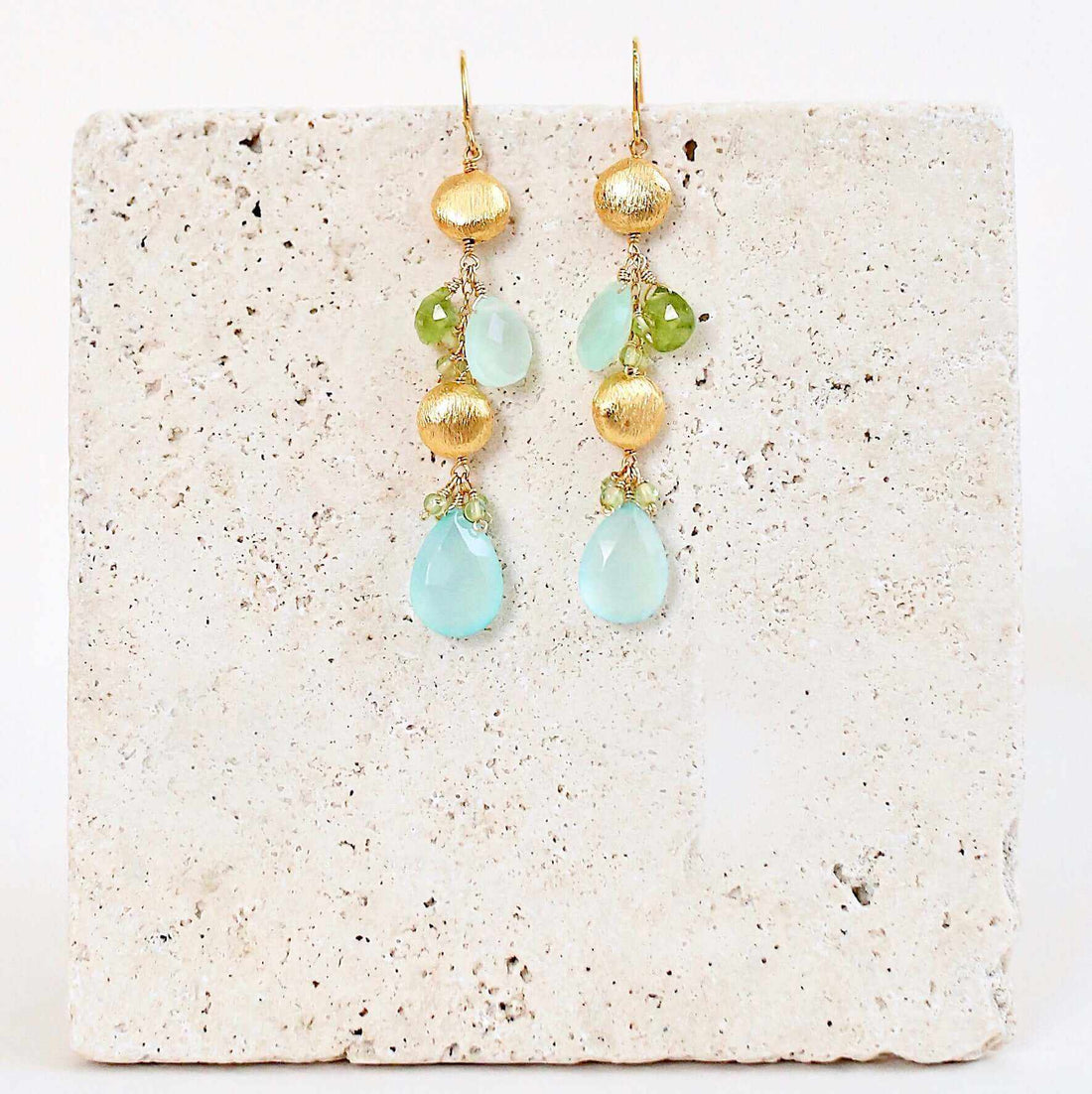 Aqua Chalcedony &amp; Peridot Gold Drop EarringsGorgeous aqua chalcedony gemstone drop earrings. Made with aqua chalcedony and peridot gemstones.- 2.5" long- French hooks- 14k gold plated .925 fine Italian sterlinEarringsPARKEN JEWELRYVettedArcAqua Chalcedony &amp; Peridot