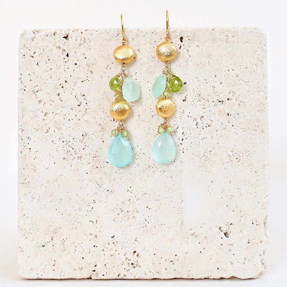 Aqua Chalcedony &amp; Peridot Gold Drop EarringsGorgeous aqua chalcedony gemstone drop earrings. Made with aqua chalcedony and peridot gemstones.- 2.5" long- French hooks- 14k gold plated .925 fine Italian sterlinEarringsPARKEN JEWELRYVettedArcAqua Chalcedony &amp; Peridot