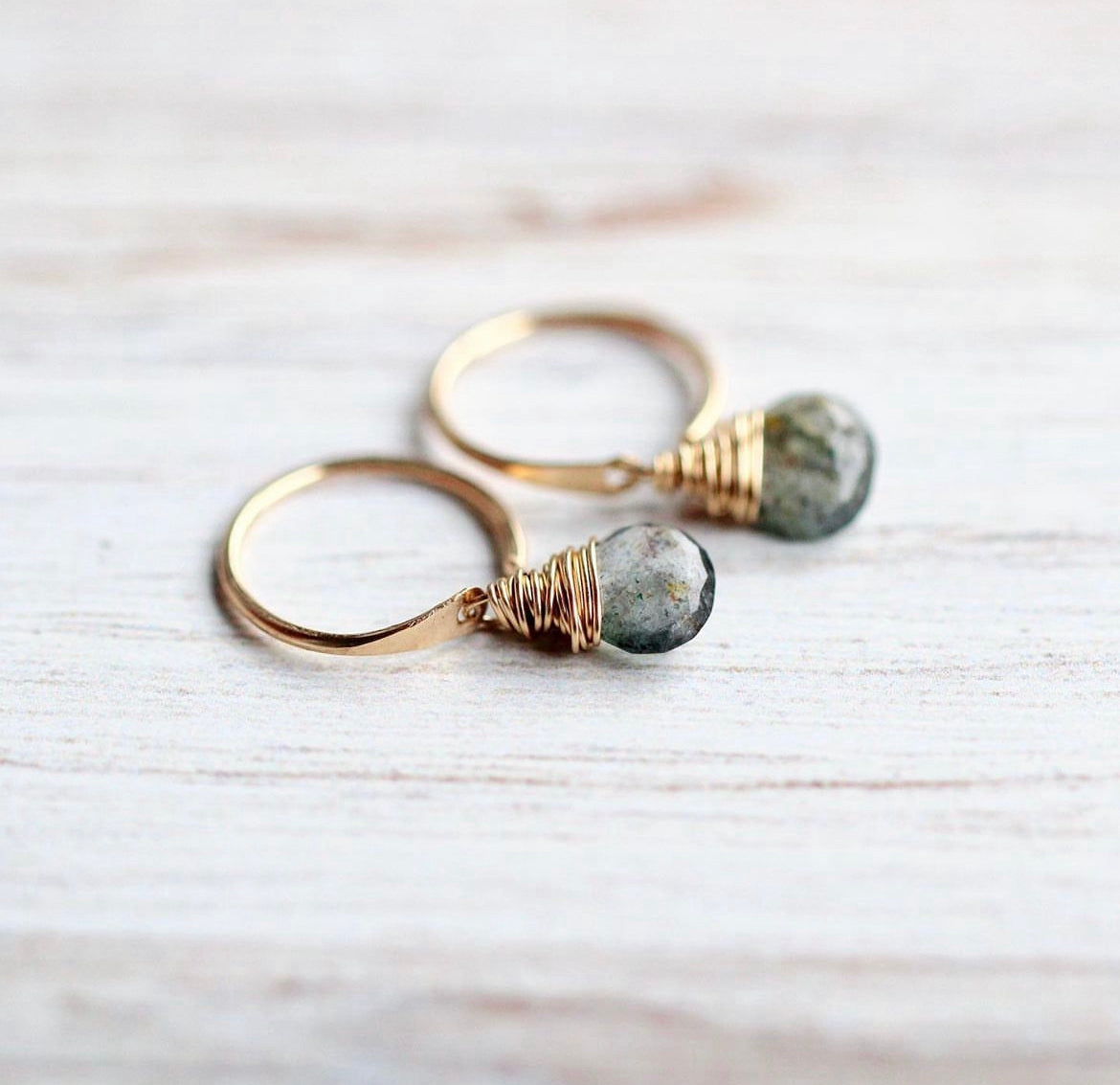 Moss aquamarine dangle hug earrings with green gemstone drops in gold-tone setting