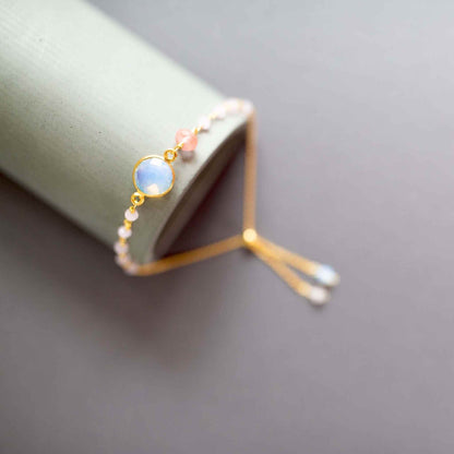 Opal Quartz Adjustable Gemstone BraceletThe ultimate arm candy and completely adjustable to fit anyone. Made with sparkling bezel gemstones and tiny stone accents.
Gorgeous alone or stacked. We&