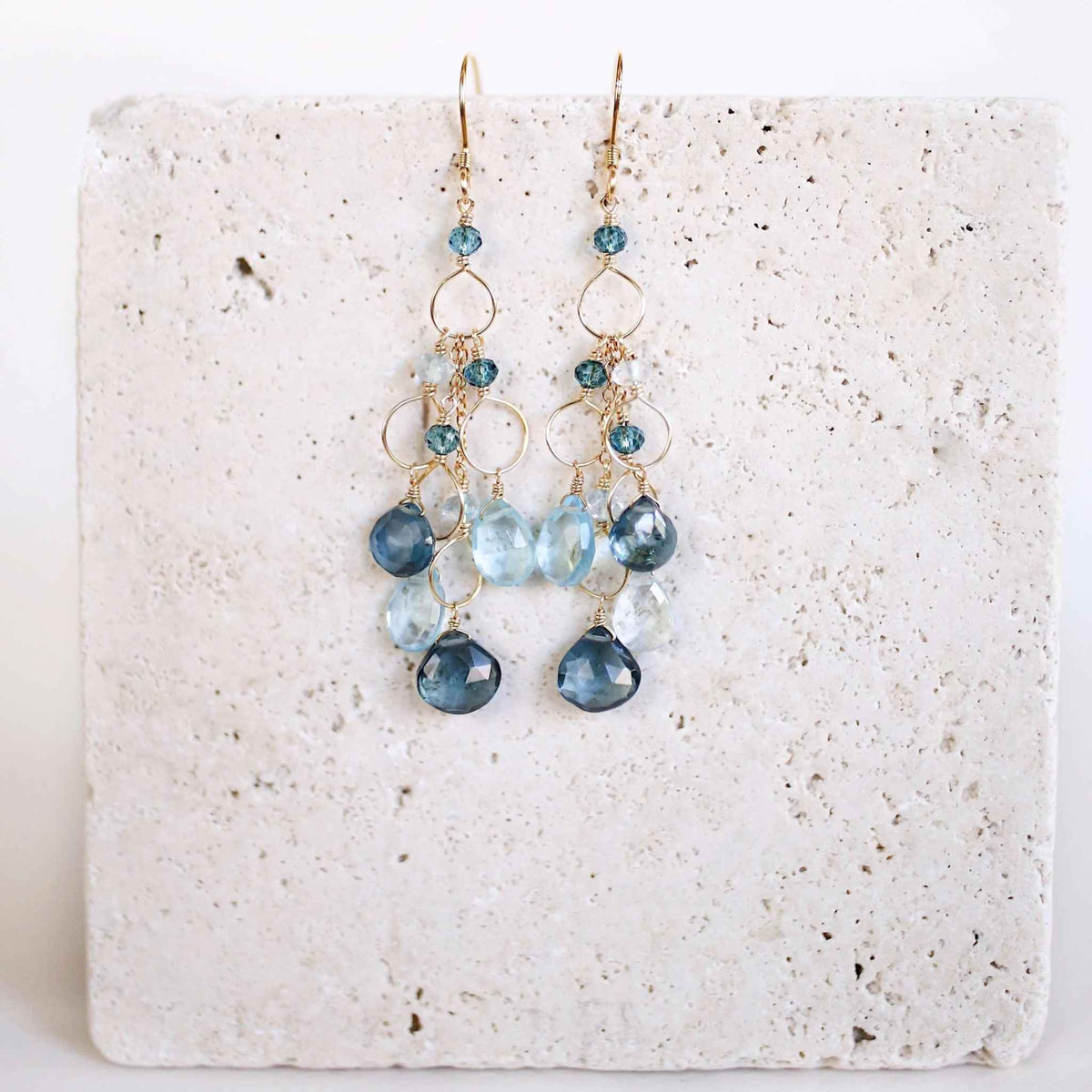 Iolite &amp; Aquamarine Gold Waterfall EarringsElegant Iolite &amp;amp; Aquamarine Gold Waterfall Earrings feature a unique tiered chandelier earring design, set in 14k gold plated over fine .925 Italian sterling silEarringsPARKEN JEWELRYVettedArcIolite &amp; Aquamarine