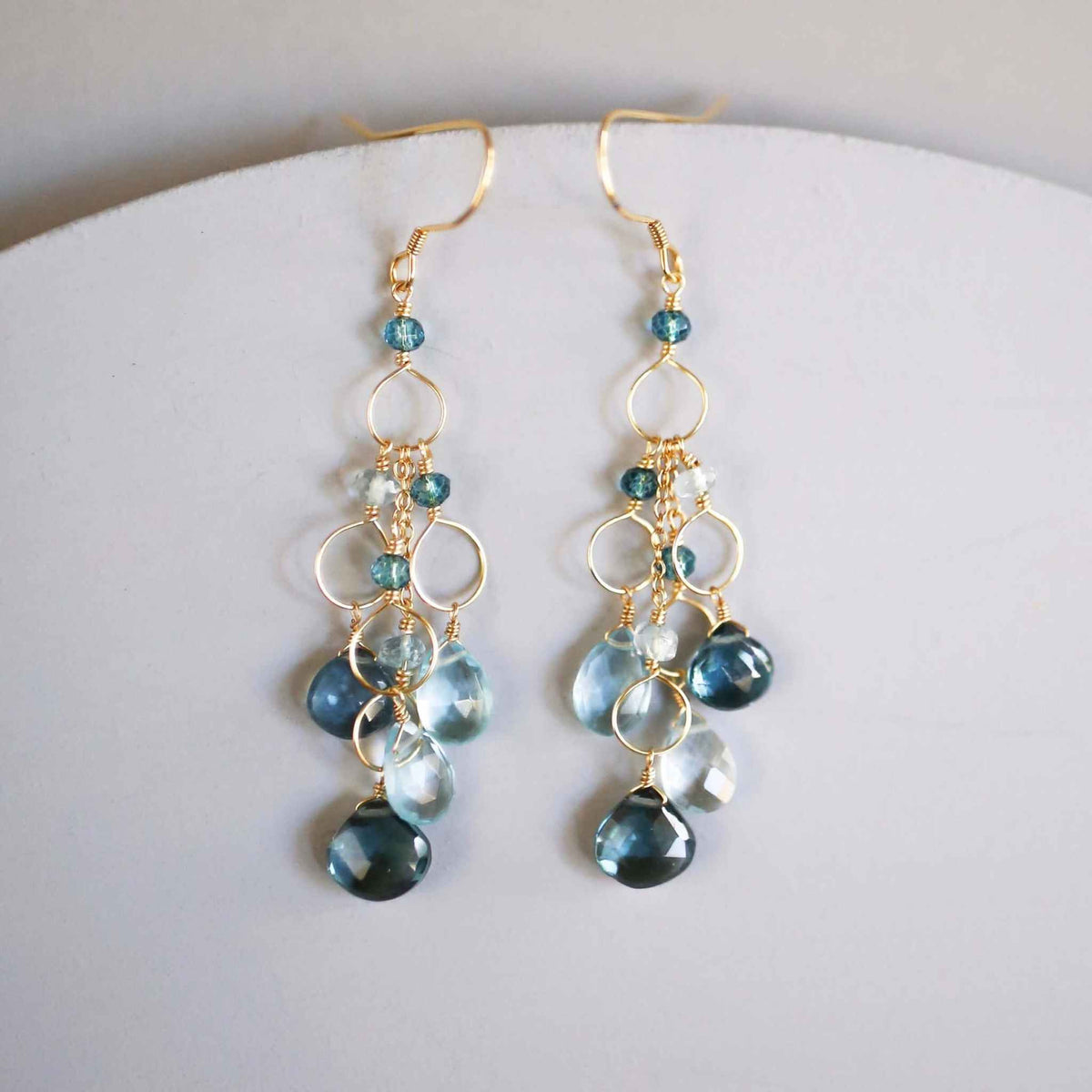 Iolite &amp; Aquamarine Gold Waterfall EarringsElegant Iolite &amp;amp; Aquamarine Gold Waterfall Earrings feature a unique tiered chandelier earring design, set in 14k gold plated over fine .925 Italian sterling silEarringsPARKEN JEWELRYVettedArcIolite &amp; Aquamarine