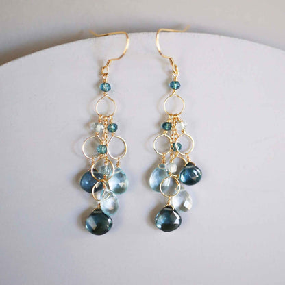 Iolite &amp; Aquamarine Gold Waterfall EarringsElegant Iolite &amp;amp; Aquamarine Gold Waterfall Earrings feature a unique tiered chandelier earring design, set in 14k gold plated over fine .925 Italian sterling silEarringsPARKEN JEWELRYVettedArcIolite &amp; Aquamarine
