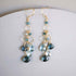 Iolite & Aquamarine Gold Waterfall EarringsElegant Iolite &amp; Aquamarine Gold Waterfall Earrings feature a unique tiered chandelier earring design, set in 14k gold plated over fine .925 Italian sterling silEarringsPARKEN JEWELRYVettedArcIolite & Aquamarine
