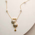 Labradorite bezel necklace with gold chain and accent stones on 14k gold plated sterling silver