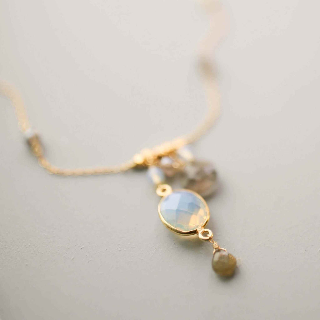 Opalite bezel necklace on gold chain with labradorite stones and spring ring clasp