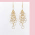 Handmade pearl chain loop earrings with 14k gold plated 925 silver, featuring natural freshwater pearls and French hooks.