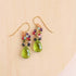 Peridot Quartz Bala EarringsStunning drops of color. Gold drop earrings made with peridot quartz topped with a rainbow cluster of gems.
- French hooks- 1.25" long- 14k gold plated .925 fine ItaEarringsPARKEN JEWELRYVettedArcPeridot Quartz