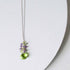 Peridot quartz raindrop pendant necklace with amethyst cluster on sterling silver chain