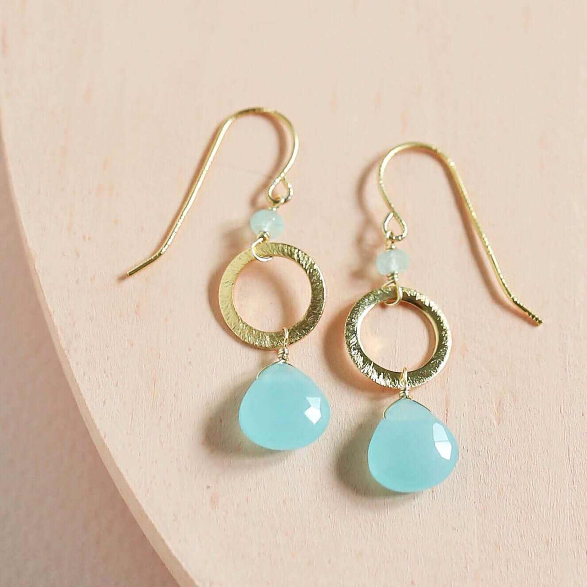 The Airie Earring with blue chalcedony gemstones and rhodium plated sterling silver French hooks