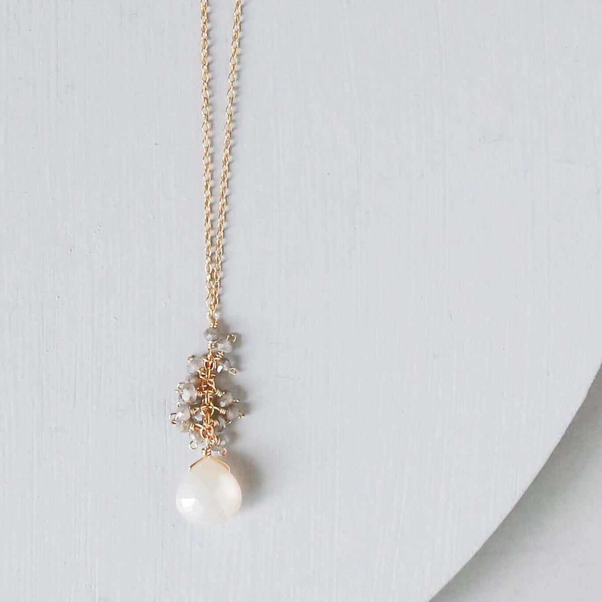 White Chalcedony Cluster Necklace with raindrop pendants and labradorite gems on gold plated sterling silver chain