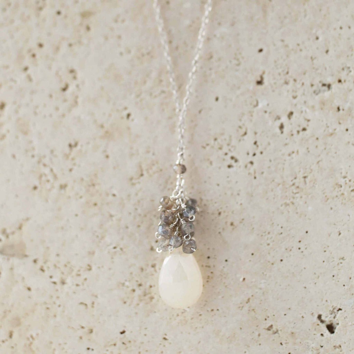 White Chalcedony Cluster Necklace with raindrop pendants and labradorite gems on gold plated sterling silver chain