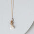 White Chalcedony silver cluster necklace with raindrop pendants and labradorite gems on sterling silver chain