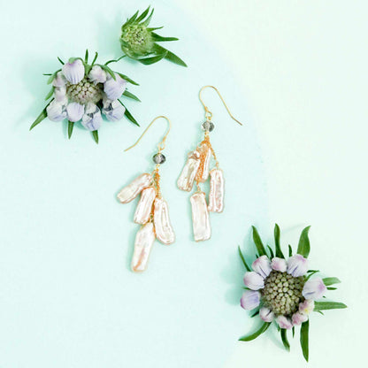 White stick pearl earrings with four freshwater pearls and black spinel on 14k gold plated sterling silver French hooks